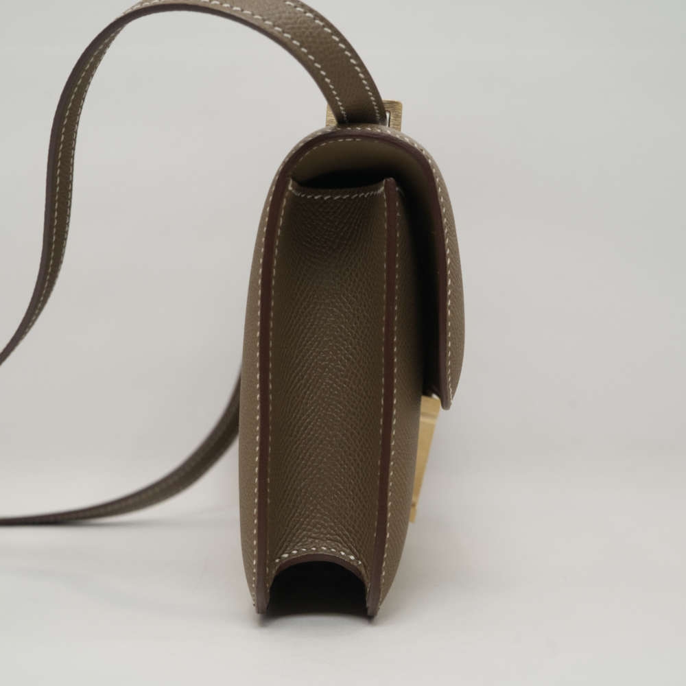 HERMES-CONSTANCEELAN-LONGCLUTCH-ETOUPE-EPSOM-7784 side.jpg