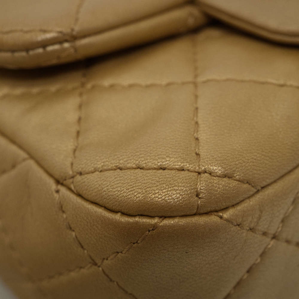 CHANEL-FLAPBAG-MINI-GOLD-LAMBSKIN-8353 corner1.jpg