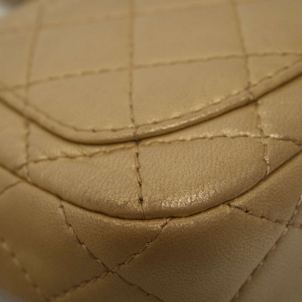 CHANEL-FLAPBAG-MINI-GOLD-LAMBSKIN-8353 corner3.jpg