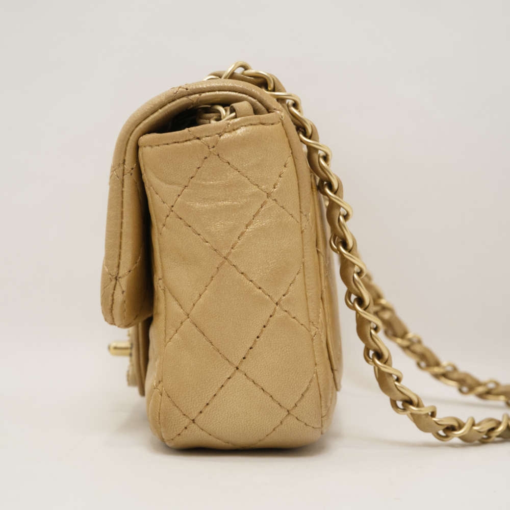 CHANEL-FLAPBAG-MINI-GOLD-LAMBSKIN-8353 side2.jpg